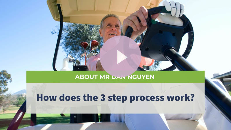 A senior man drives a golf cart on a sunny day, sporting a big smile on his face.