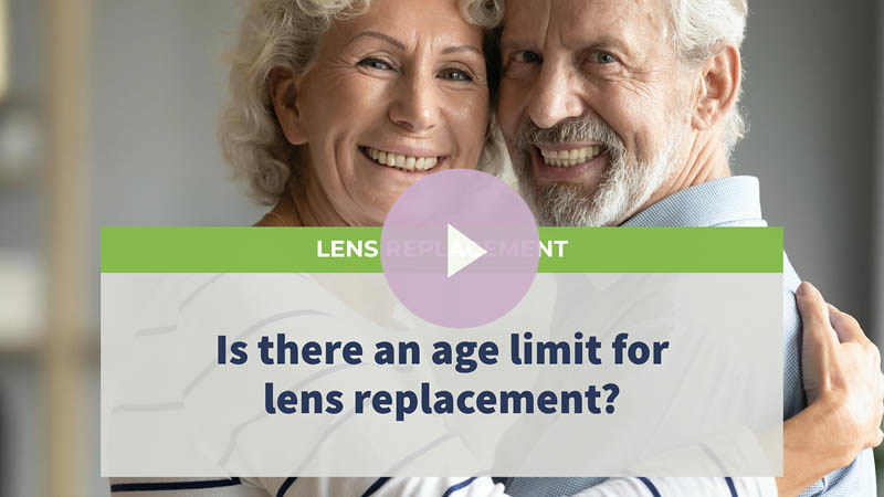 A senior couple hugging each other, smiling at the camera.