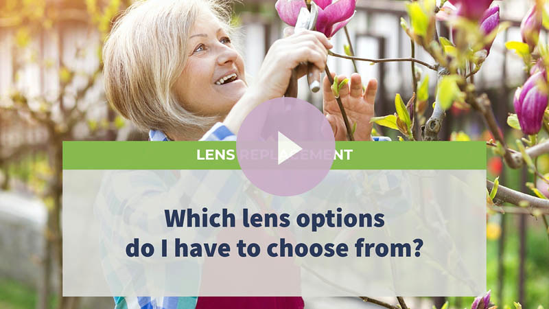 Mature woman looking joyful and proud as she admires flowers in her garden.